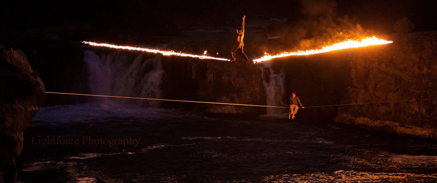 Ray on a fire slackline at Steelhead Falls, Oregon, 2013